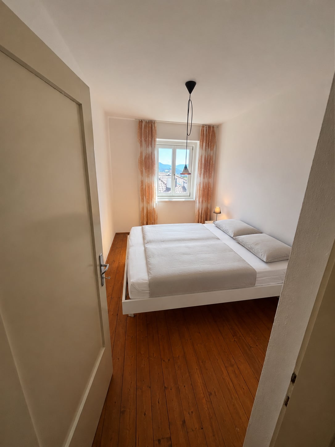 Bright bedroom with a calm residential atmosphere
